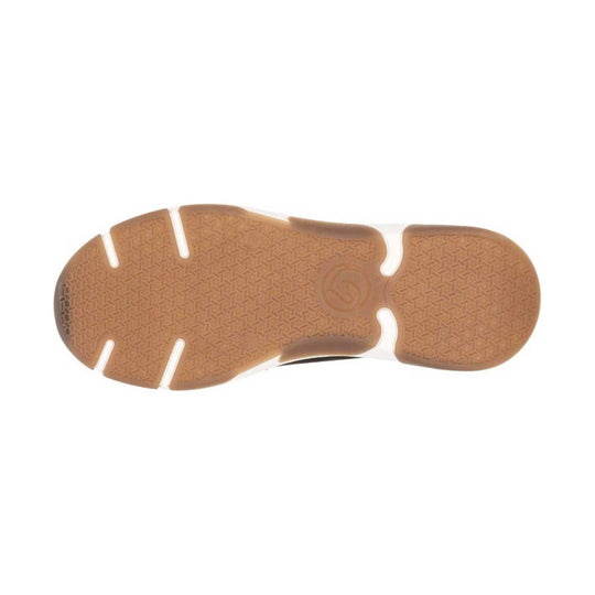 Tan rubber shoe outsole with geometric tread pattern and flex grooves