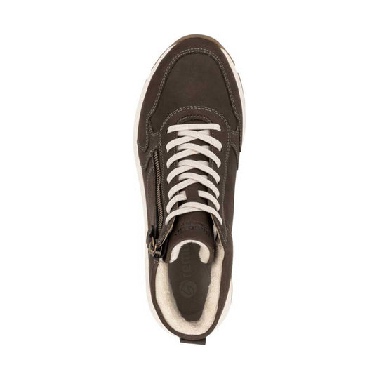 Brown lace-up ankle boot with white laces, side zipper, and cream shearling lining