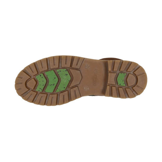 Brown boot outsole with lug tread and green traction inserts
