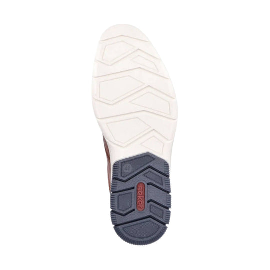 White shoe sole with gray tread and visible rieker logo