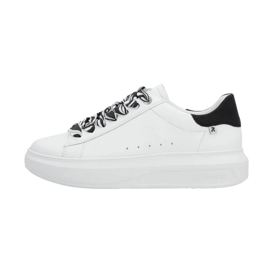 White platform sneaker with black heel accent and zebra-print laces, side view