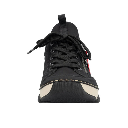 Black low-top shoe with thick laces, cream toe accents, and a side zipper