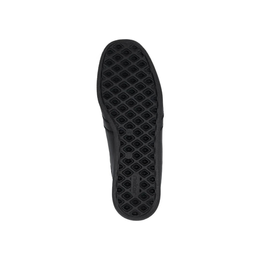 Black boot sole with diamond tread pattern and visible Rieker branding