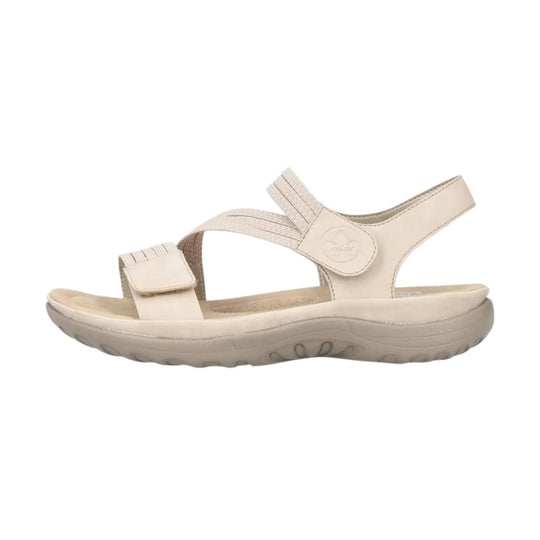 Beige women’s sport sandal with adjustable straps and thick cushioned sole, side view