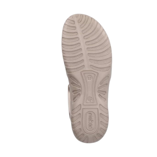 Beige sandal outsole with textured tread and Rieker branding
