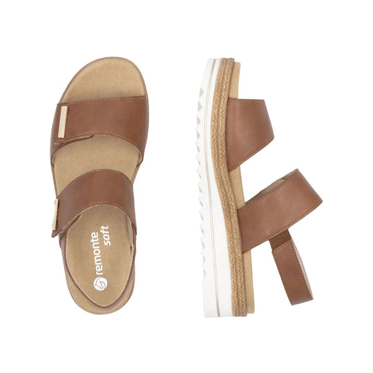 Brown leather double-strap sandal with tan footbed and white platform sole