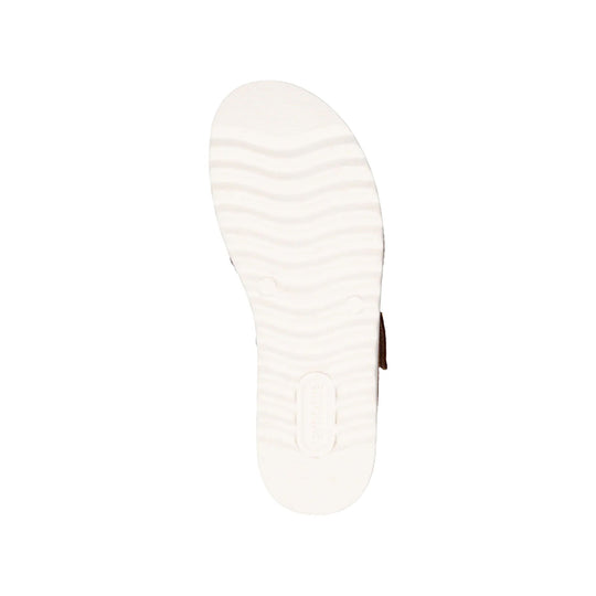 White sandal outsole with textured tread and embossed branding