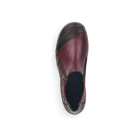 Red slip-on shoe with black toe cap, side zipper, and brown sole