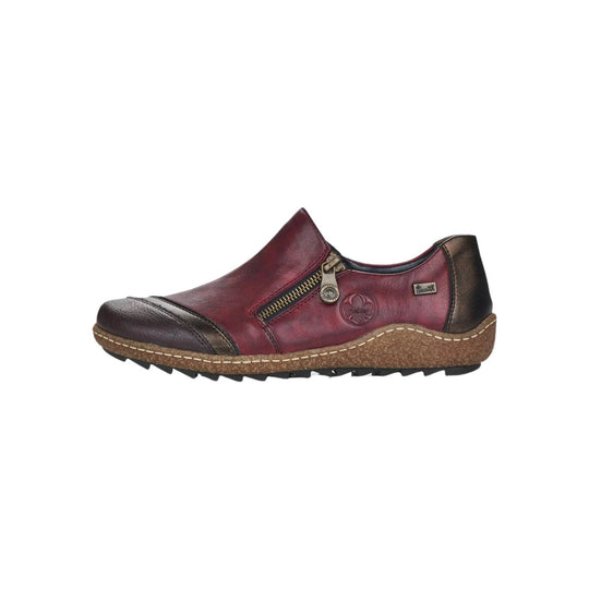 Burgundy slip-on shoe with side zipper, black toe cap, cork-look sole, and white stitching