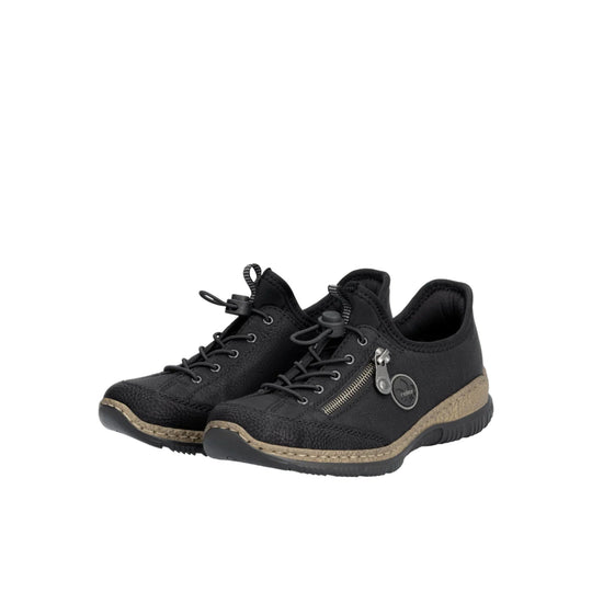 Black low-top lace-up sneakers with side zippers, textured leather-like upper, and tan midsole trim