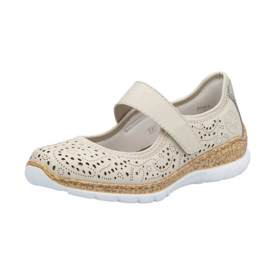 Cream Mary Jane shoe with perforated upper, wide strap, and cushioned white sole