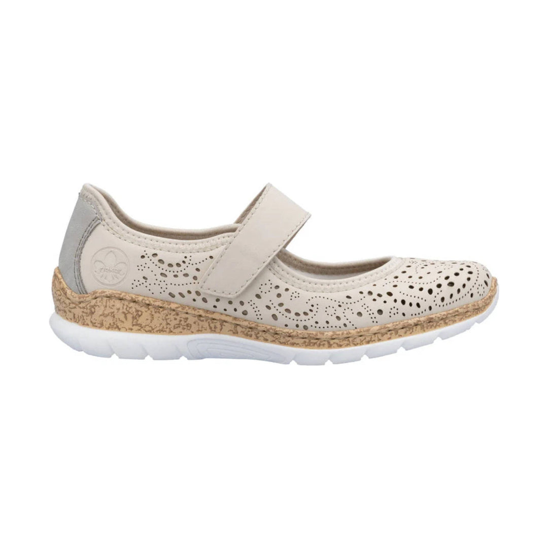 Cream Mary Jane shoe with perforated upper, velcro strap, and cork-look midsole