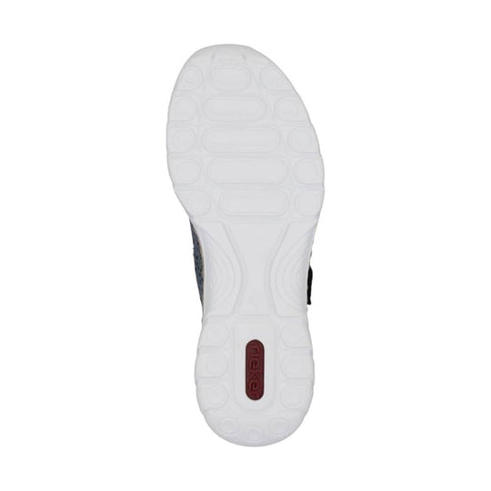 White shoe outsole with rounded tread pattern and a red Rieker logo insert