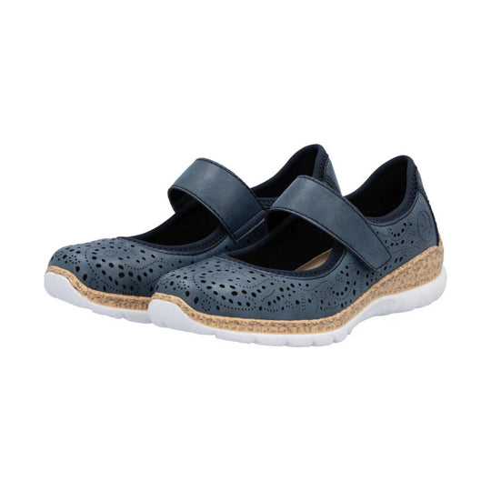 Navy Mary Jane flats with perforated upper, strap closure, cork-style trim, and white soles