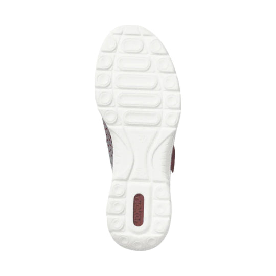 White sneaker outsole with a maroon Rieker logo insert