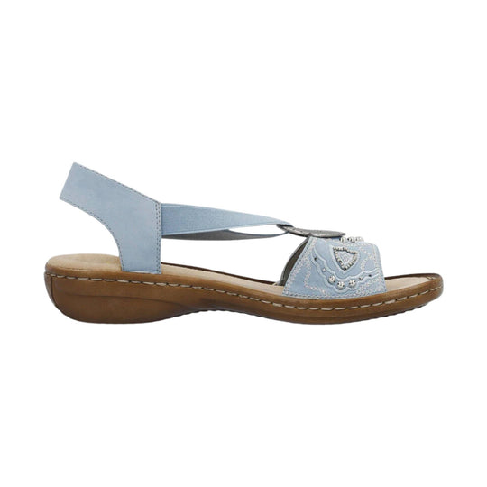 Light blue slingback sandal with a low wedge heel and decorative toe strap
