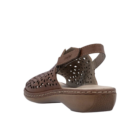Brown closed-toe sandal with perforated upper, ankle strap, and low wedge sole