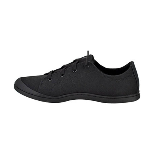 Black low-top lace-up shoe with a rounded toe and textured upper, side view