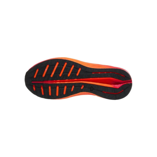 Black, orange, and red running shoe outsole shown from below with deep tread and segmented grip pods.