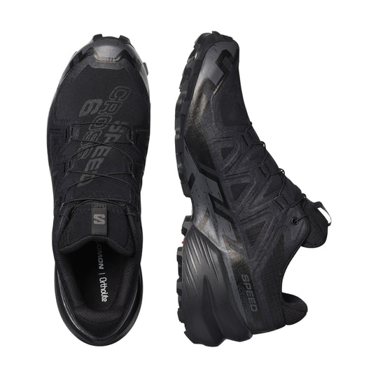 Black trail running shoe shown in top and side views with lugged outsole and quick-lace system