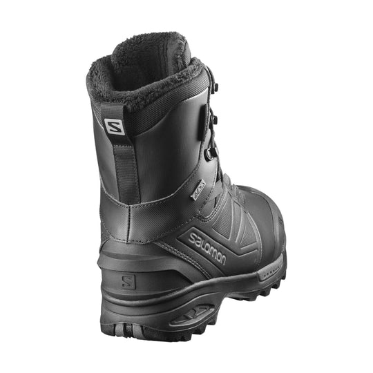 Black insulated winter boot with a tall cuff, rugged tread, and Salomon logo on the side