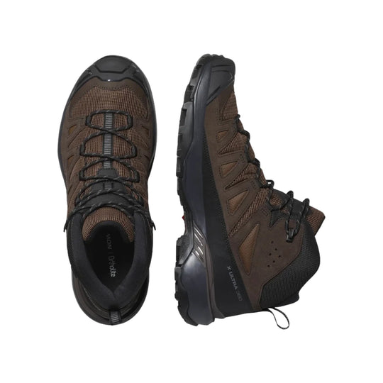 Brown and black mid-cut hiking boots with mesh panels, bungee laces, and chunky lug soles