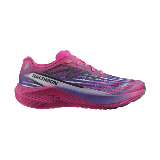 Pink and purple running shoe with a low profile, knit upper, and thick cushioned sole