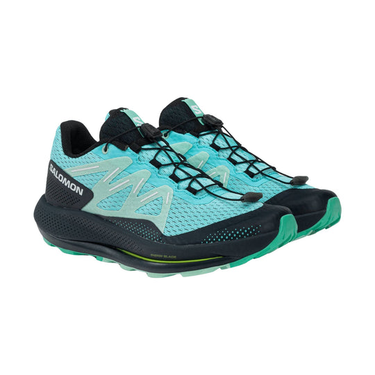 Turquoise and black trail running shoes with bungee laces and Salomon branding
