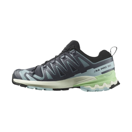 Low-profile trail running shoe in dark gray and black with light blue accents and a lime-green heel