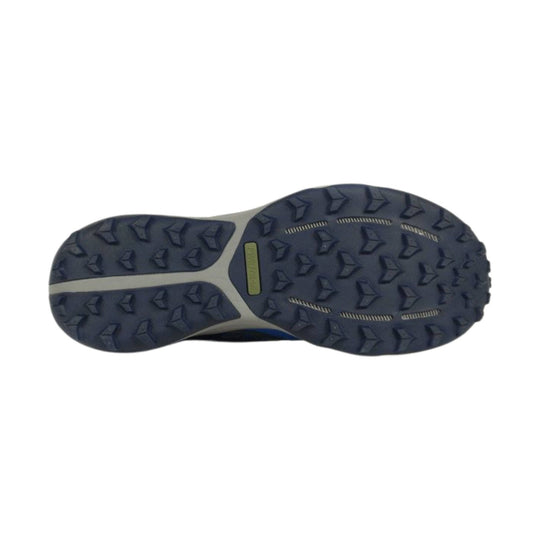 Dark blue trail shoe outsole with deep lugged tread and gray rubber support sections