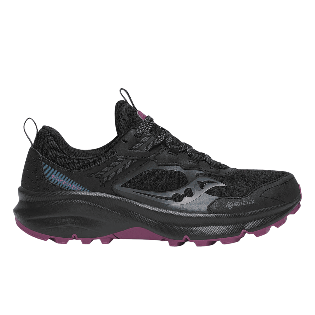 Black trail running shoe with chunky sole, side cutouts, bungee laces, and plum outsole accents.