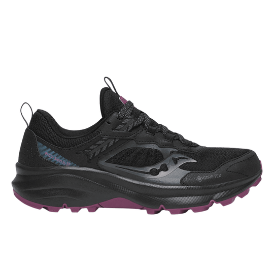 Black trail running shoe with chunky sole, side cutouts, bungee laces, and plum outsole accents.
