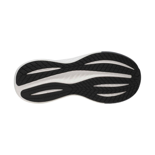 Black rubber shoe outsole with white midsole foam and tread grooves