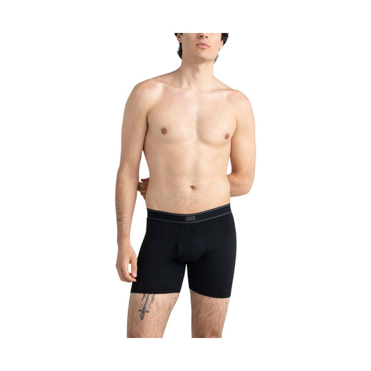 Black boxer briefs with a logo waistband on a model