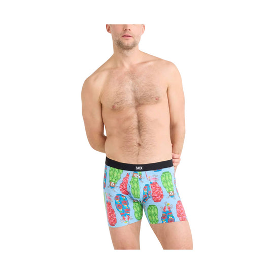Blue boxer briefs with colorful cartoon print and a black SAXX waistband