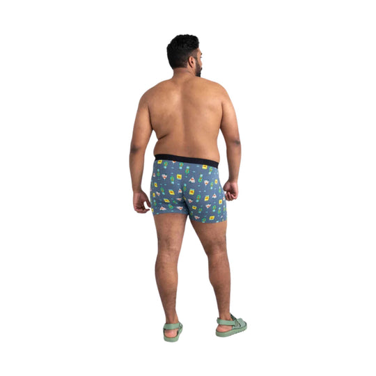 Back view of blue patterned boxer briefs on a model
