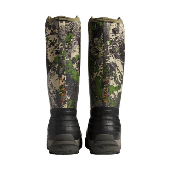 Pair of camo knee-high rubber boots with black lower sections and orange SITKA text
