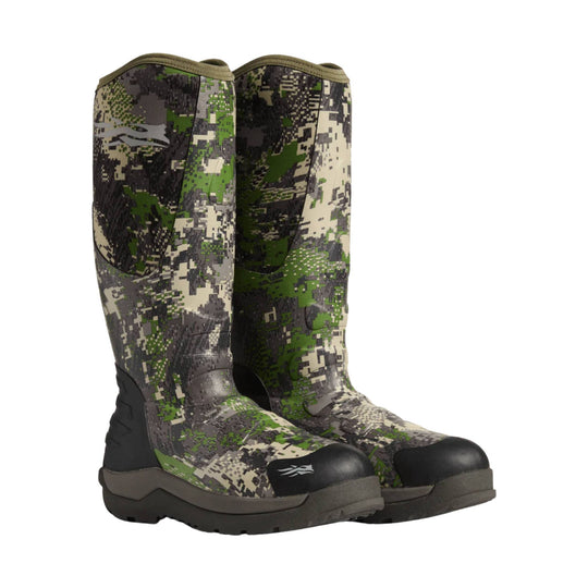 Pair of camouflage knee-high pull-on boots with black toe caps and thick tread soles