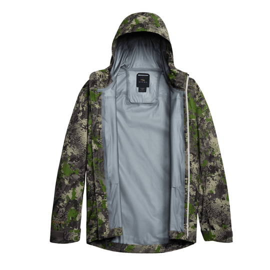 Camouflage hooded jacket with a gray inner lining, front zipper, and visible SITKA neck tag