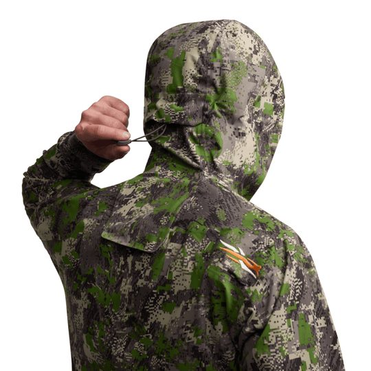 Camouflage hooded jacket shown from the back with a raised hood and a visible shoulder logo