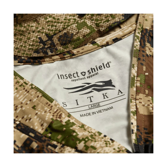 Camouflage hoodie interior with insect shield label and SITKA branding