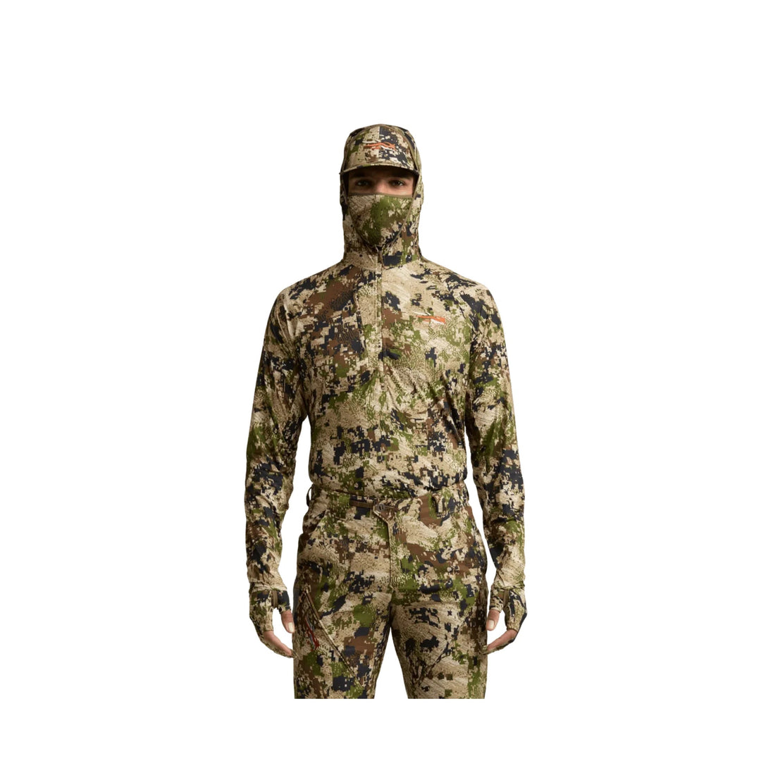 Camouflage hooded long-sleeve top with face covering, shown front view