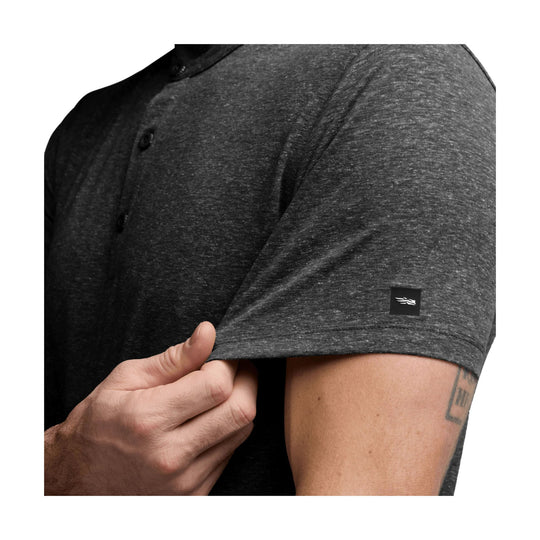 Dark heathered short-sleeve henley shirt with three-button placket and small sleeve logo patch