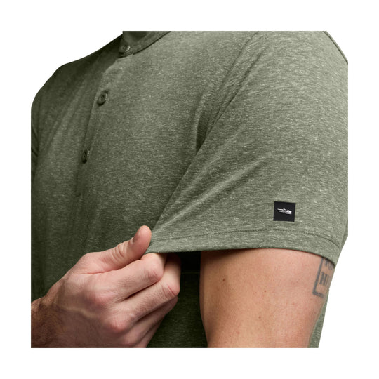 Short-sleeve heathered olive henley shirt with three-button placket and small sleeve logo patch
