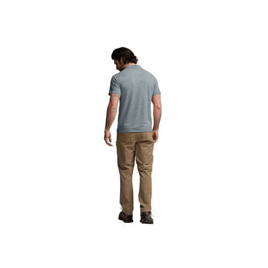 Men's gray short-sleeve polo shown from the back with tan pants and trail shoes