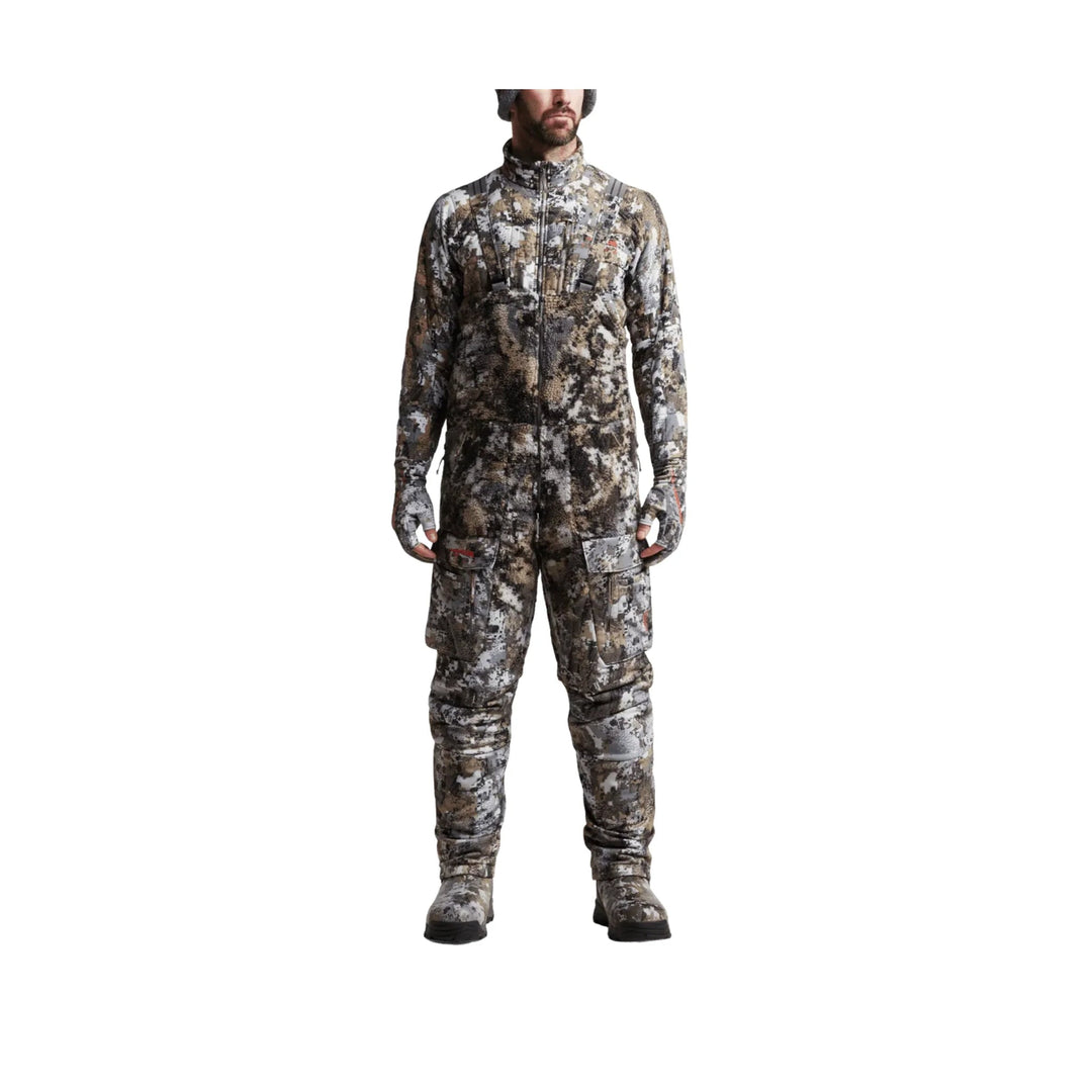 Camouflage hunting bib with full-zip front, cargo pockets, and boots