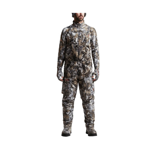 Camouflage hunting bib with full-zip front, cargo pockets, and boots