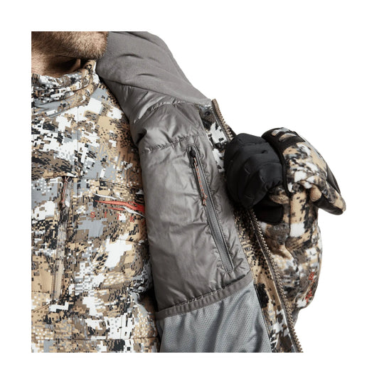 Camo insulated jacket with gray sleeve, hood, zip pocket, and black gloves