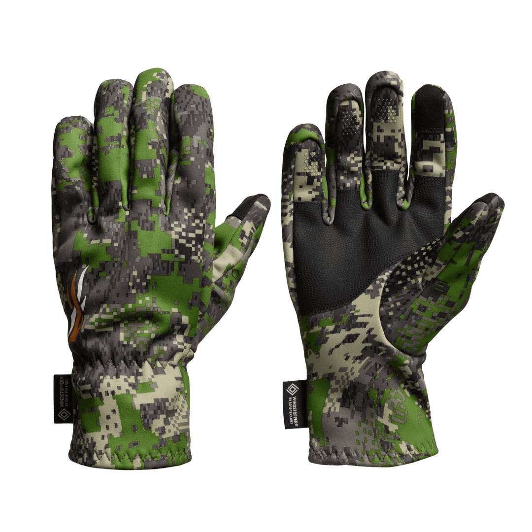Pair of camouflage insulated gloves with black palms and touch-screen fingertips