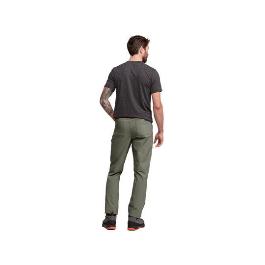 Man wearing olive green pants and a dark gray T-shirt, shown from the back